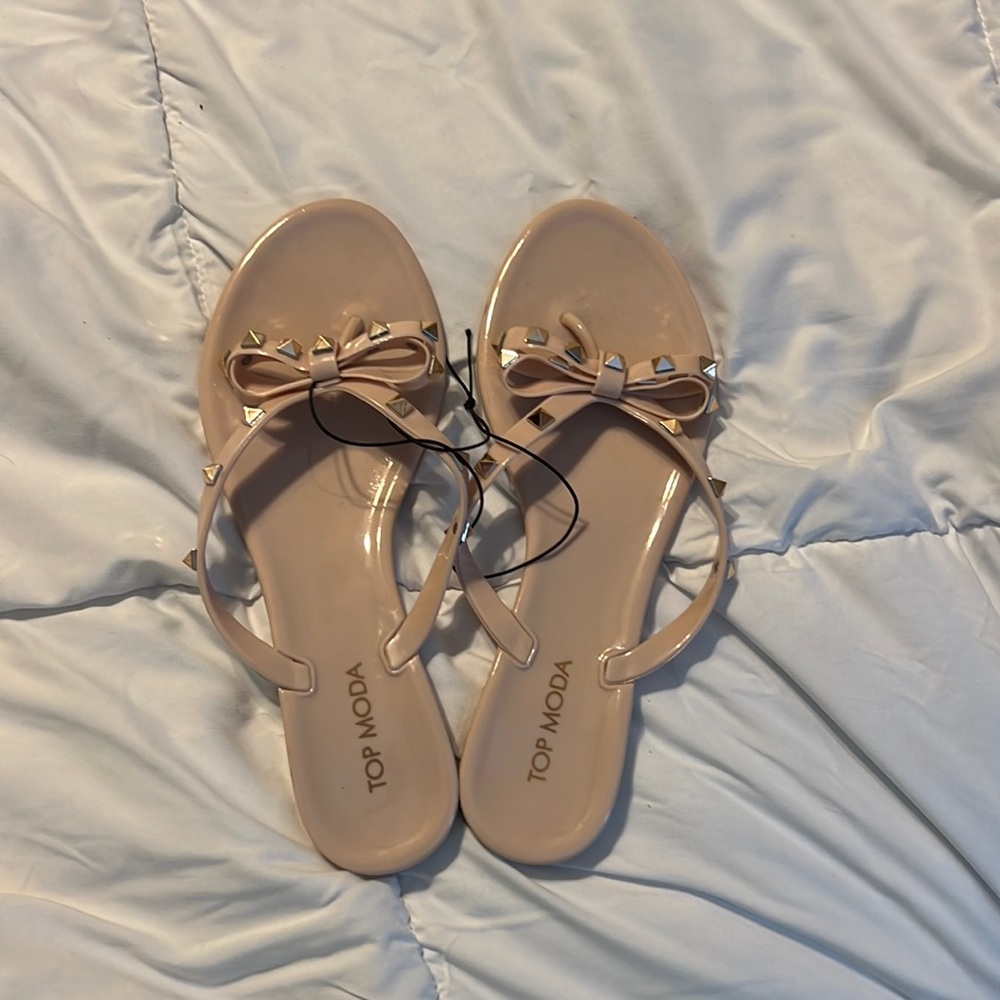 Size 8 flip flops, tan/beige, never worn